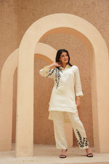 MINIMALIST EMBROIDERED STRAIGHT KURTA WITH COLLARED NECK & LEAF DETAILING