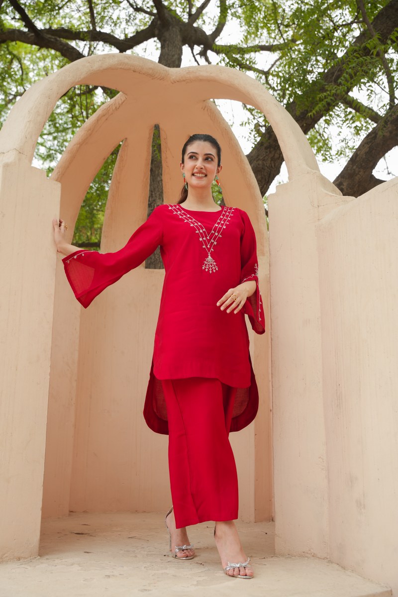 FESTIVE ELEGANCE: CALF-LENGTH ROMAN SILK COORDINATED SET WITH MINIMALISTIC EMBROIDERY AND FLARED SLEEVES