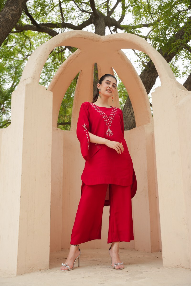 FESTIVE ELEGANCE: CALF-LENGTH ROMAN SILK COORDINATED SET WITH MINIMALISTIC EMBROIDERY AND FLARED SLEEVES