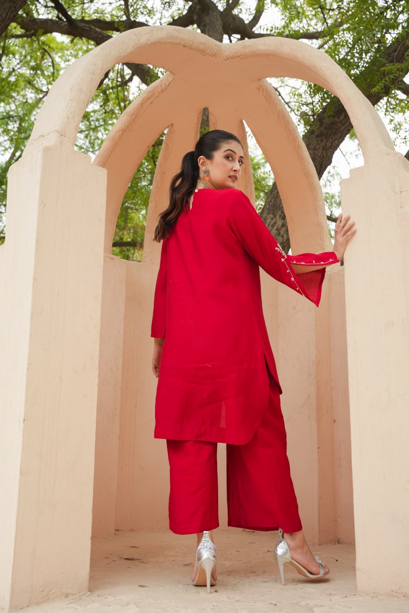 FESTIVE ELEGANCE: CALF-LENGTH ROMAN SILK COORDINATED SET WITH MINIMALISTIC EMBROIDERY AND FLARED SLEEVES